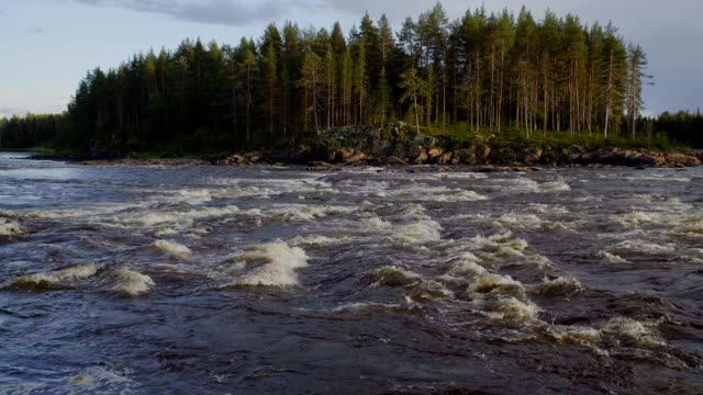 river-with-rapids-in-the-north-of-Finland.-boiling-water