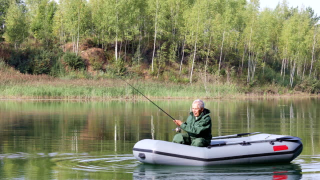 Senior-fishing-in-a-boat