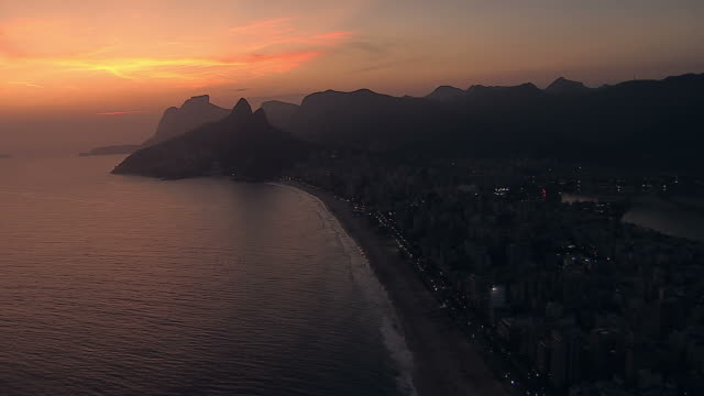 High-angle-aerial-view-of-Rio-de-Janeiro-at-Dusk,-Brazil