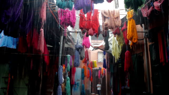 Colored-dyed-yarn-is-dried-on-the-streets-of-Morocco