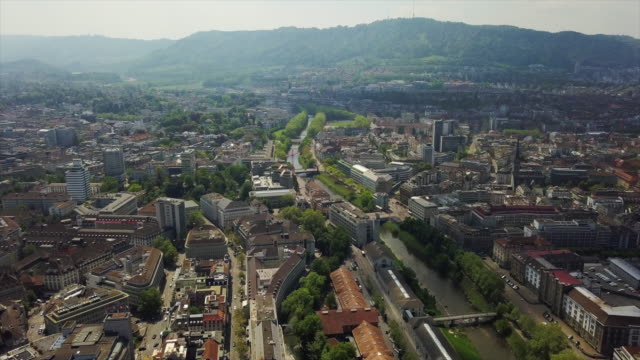 switzerland-zurich-riverside-cityscape-aerial-panorama-4k