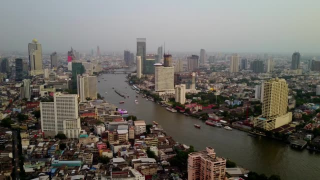 Aerial-footage-scene-of-city-and-river,-Bangkok,-Thailand