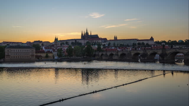 Day-to-Night-time-lapse-video-of-Prague-city-skyline-with-Vltava-River-in-Czech,-Republic-timelapse-4K