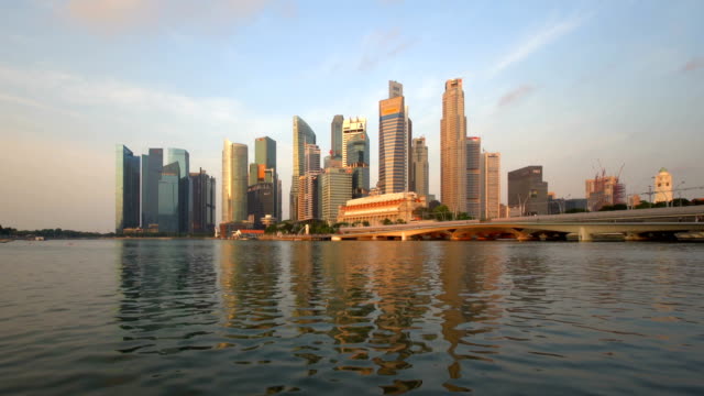 Downtown-Singapore-city-in-Marina-Bay-area-at-sunrise.-Financial-district-and-skyscraper-buildings.