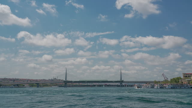 ferry-services-at-sea,-traffic-on-the-bridge,-time-lapse
