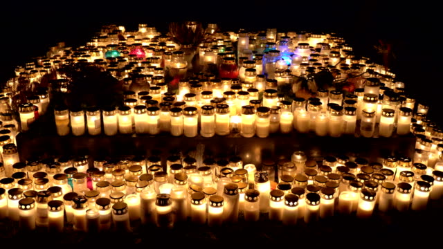 Bright-lights-of-burning-candles-in-the-darkness