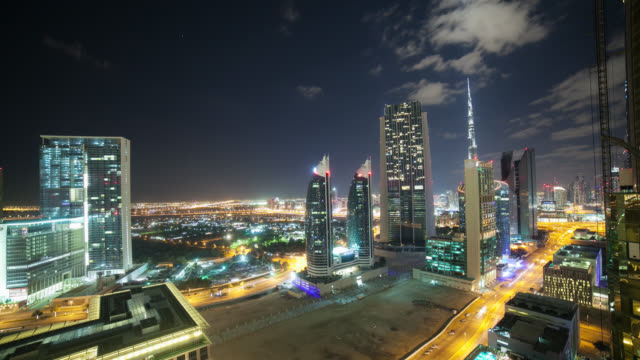 4k-time-lapse-from-the-roof-on-night-dubai-city