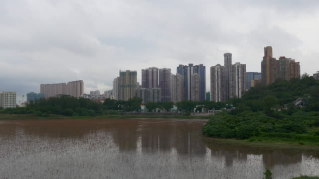 panorama-de-estanque-Bahía-de-China-Macao-ciudad-día-tiempo-4k