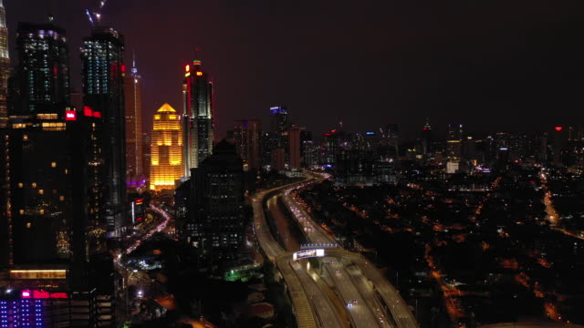 night-illuminated-kuala-lumpur-downtown-traffic-road-aerial-panorama-4k-malaysia