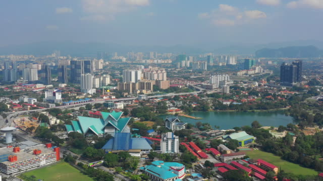 soleado-día-Kuala-Lumpur-centro-de-la-ciudad-famoso-Parque-Lago-panorama-aéreo-4k-Malasia