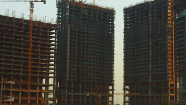 Tilt-Up-shot-of-a-buildings-under-construction