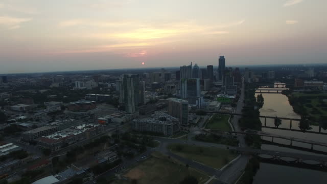 Aerial-view-of-Austin-skyline-at-nightfall---Austin,-Texas,-USA