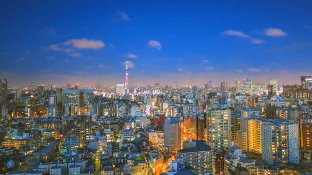 4K.-Vista-en-tiempo-de-lapso-de-la-ciudad-de-Tokio-en-Nigh-twith-torre-de-Tokio-en-Japón