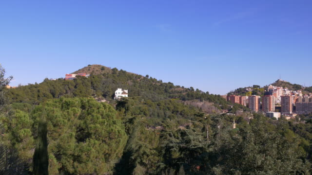 sunny-day-barcelona-city-mountain-4k-spain