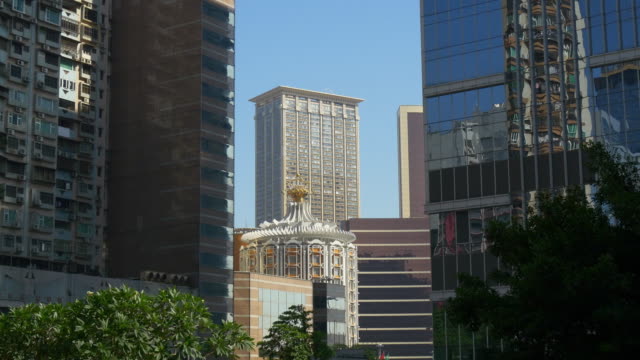China-Sonnentag-Macau-Hotels-in-der-Innenstadt-vorderen-Reflexion-Stadtpanorama-4k