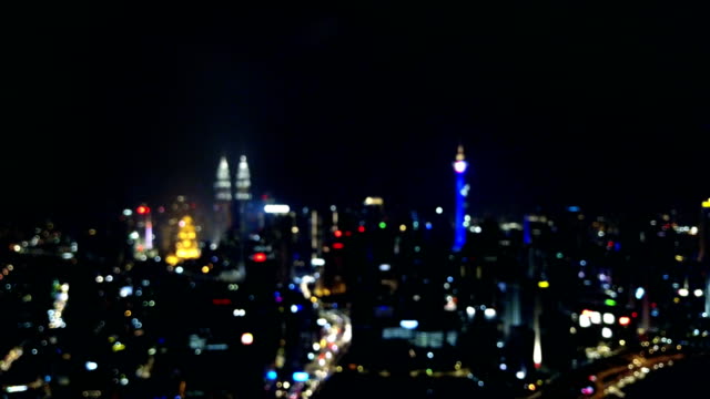 Unschärfe-oder-Bokeh-Licht-der-Metropole-Kuala-Lumpur-für-Hintergrund-Konzept.