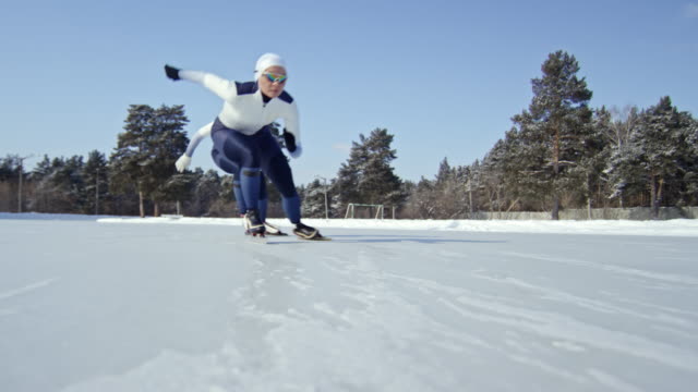 Frauen-üben-Speed-Skating-Rink