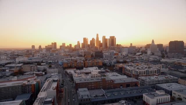 Aerial-shot-looking-towards-Downtown-Los-Angeles-during-the-sunset