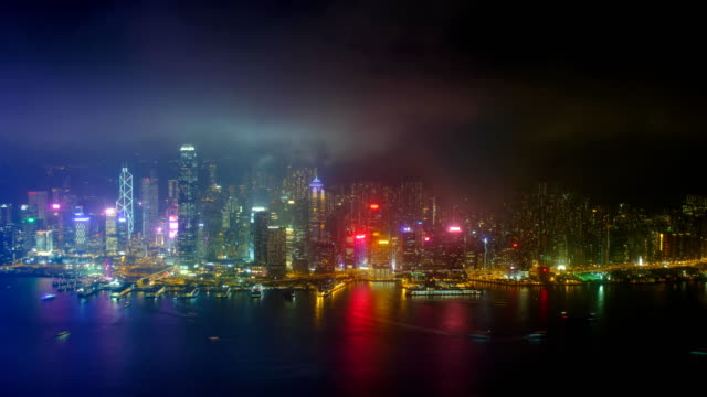 Aerial-timelapse-of-illuminated-Hong-Kong-skyline.-Hong-Kong,-China