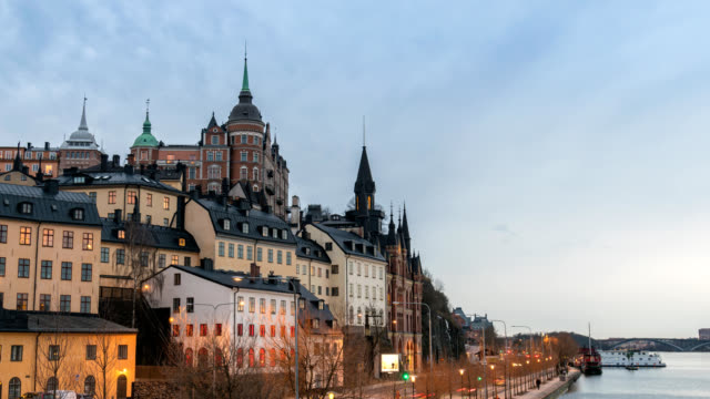 Stockholm-Sweden-time-lapse-4K,-city-skyline-day-to-night-sunset-timelapse-at-Slussen