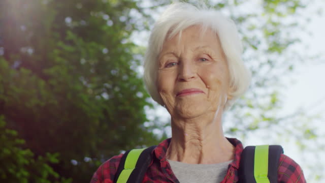 Senior-Female-Hiker-Smiling-at-Camera