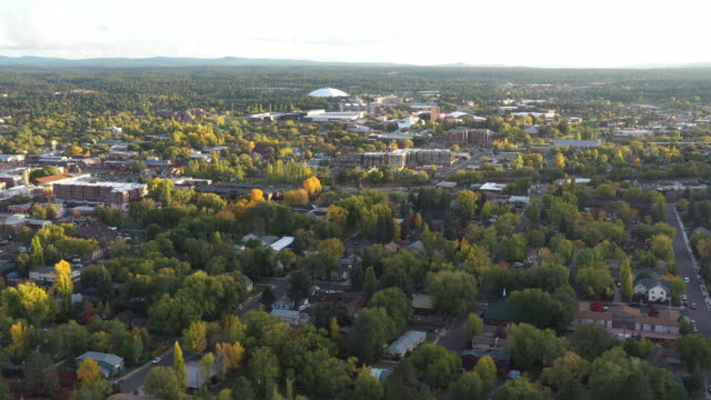 Aerial-drone-view-of-a-small-hilly-town,-Flagstaff-mountain,-Arizona,-USA