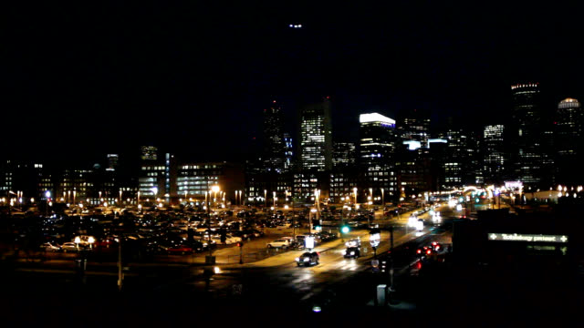 Boston-Skyline-at-night-with-helicopter-flying