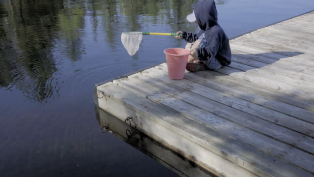 kid-boy-child-fishing-from-dock