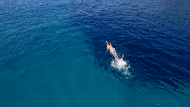Man-swimming-at-the-sea