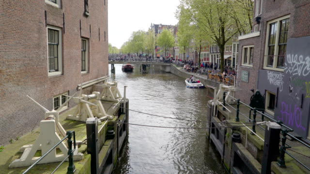 The-big-boat-cruising-the-canal-in-Amsterdam