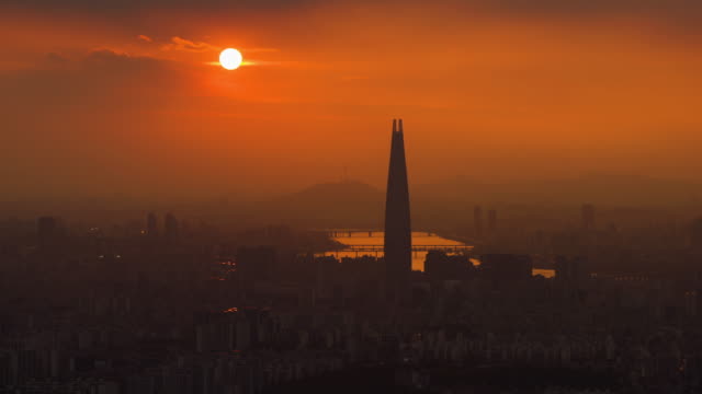Time-lapse-Sunset-of-Seoul-City-and-Lotter-Tower-,South-Korea.