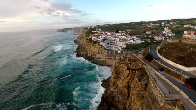 aerial-view-of-ocean-near-Azenhas-do-Mar,-Portugal-seaside-town.