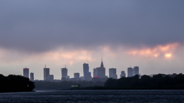 Slider-time-lapse-of-rainy-sunset-in-Warsaw-with-beautiful-skyline-above-the-Vistula-river