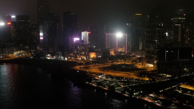 Dubai-ciudad-nocturna-con-las-luces-de-la-ciudad,-ciudad-nueva-de-alta-tecnología-de-lujo,-en-Medio-Oriente.-Stock.-Vista-superior-de-los-rascacielos-en-Dubai-por-la-noche