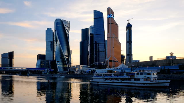 Sunset-time-lapse-of-Moscow-City-(Moscow-International-Business-Center)-and-calm-Moskva-river,-Russia.