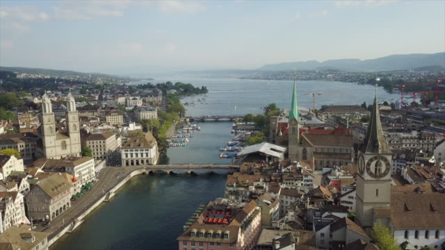 día-soleado-zurich-ciudad-centro-lago-vista-aérea-Suiza-panorama-4k