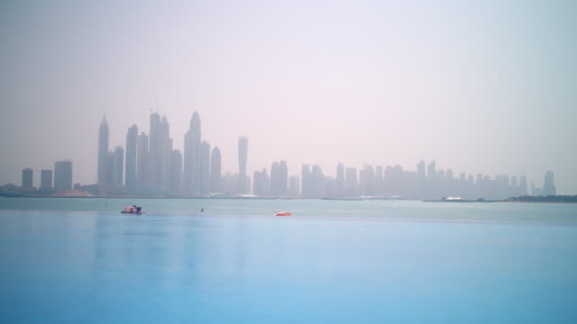 sunny-day-dubai-marina-pool-view-time-lapse