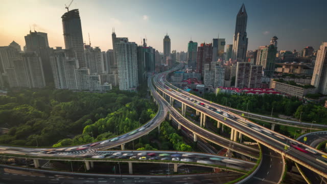 china-sunset-sunrise-traffic-road-junction-shanghai-roof-top-panorama-4k-time-lapse