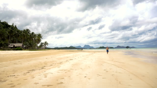 Man-running-on-the-beach