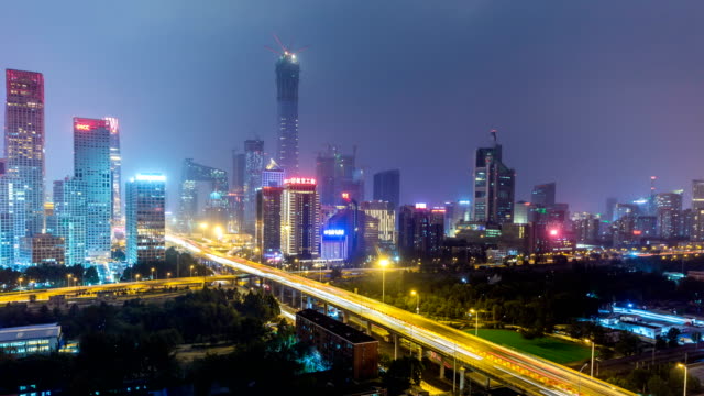 Lapso-de-tiempo-de-Jianwai-SOHO,-el-horizonte-de-la-CDB-en-la-noche-en-Beijing,-China