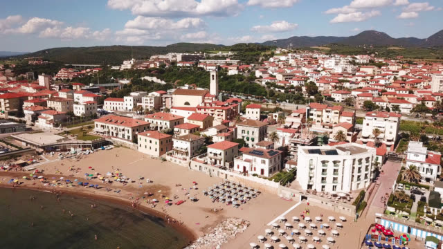 San-Vincenzo,-Tuscany,-Italy,-2018.-Aerial-view-of-the-sea,-beach-and-city