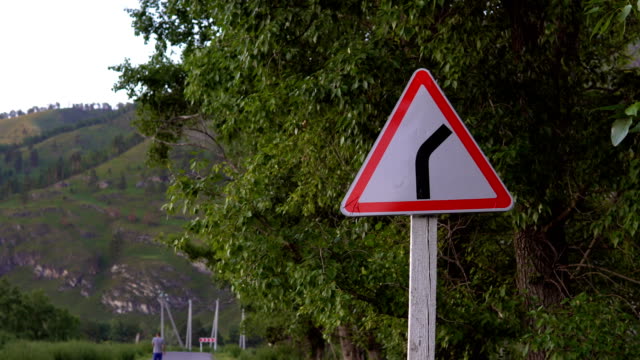 Road-sign.-A-sharp-turn.