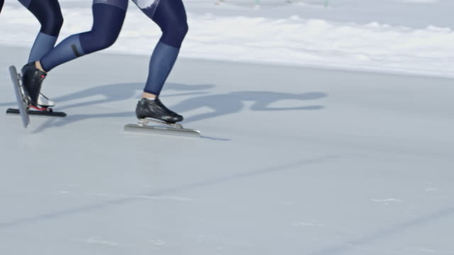 Professional-Athletes-Practicing-Speed-Skating