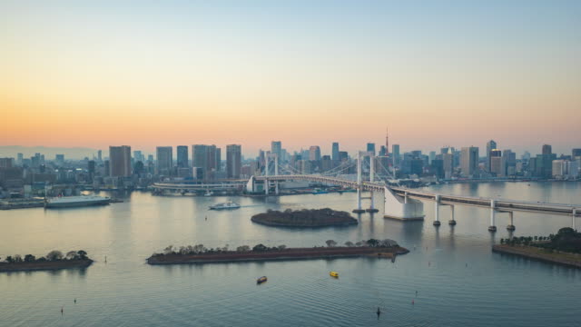 Time-lapse-of-Tokyo-city-skyline-view-from-Odaiba-in-Japan-day-to-night-timelapse-4K