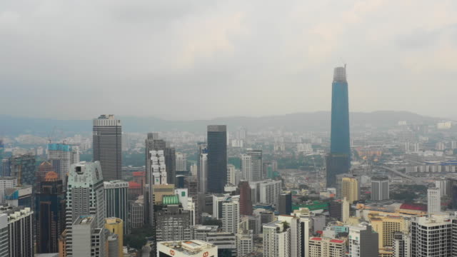 Kuala-Lumpur-Stadtbild-berühmten-Gebäude-der-Innenstadt-von-Bau-aerial-Panorama-4k-Malaysia