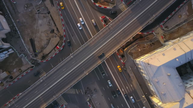 russia-sunset-sky-moscow-city-center-traffic-road-junction-aerial-down-panorama-4k