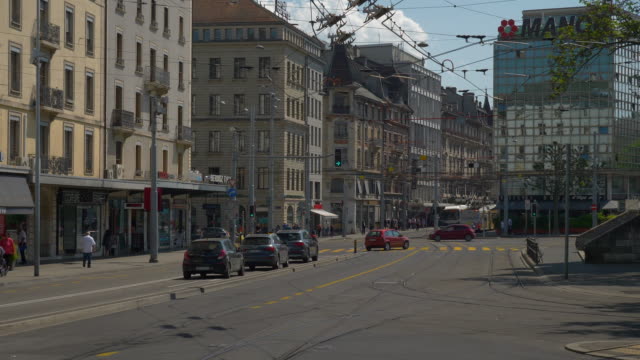 Suiza-día-tiempo-Ginebra-ciudad-tráfico-calle-panorama-4k