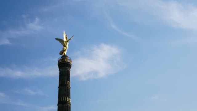Time-Lapse:-The-Victory-Column-In-Berlin,-Germany-Against-A-Blue-Cloudy-Sky