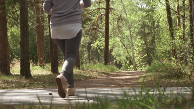 Elderly-People-Exercising-and-Walking-in-Forest