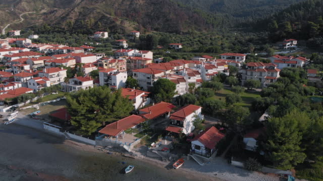 Aerial-view-of-the-small-Greek-village-on-the-shore-of-the-Aegean-Sea